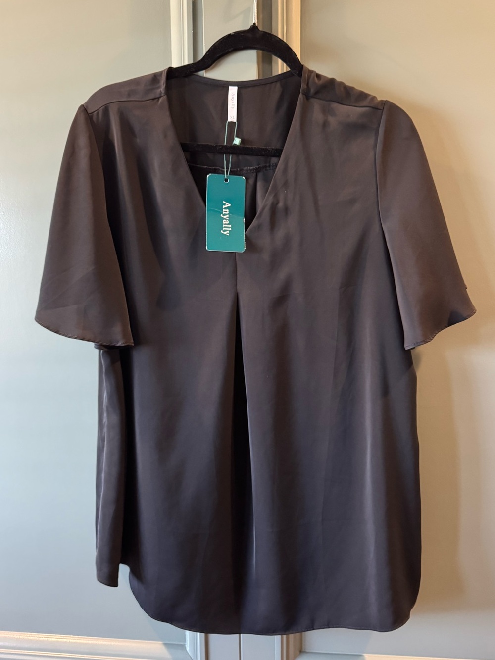 NWT. Women's Black Short Sleeve V-Neck Blouse